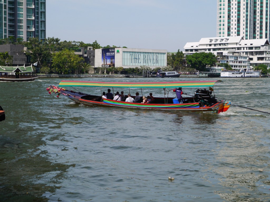 Long-Tail Boat Leaving Sathorn Pier On Chao Phraya River